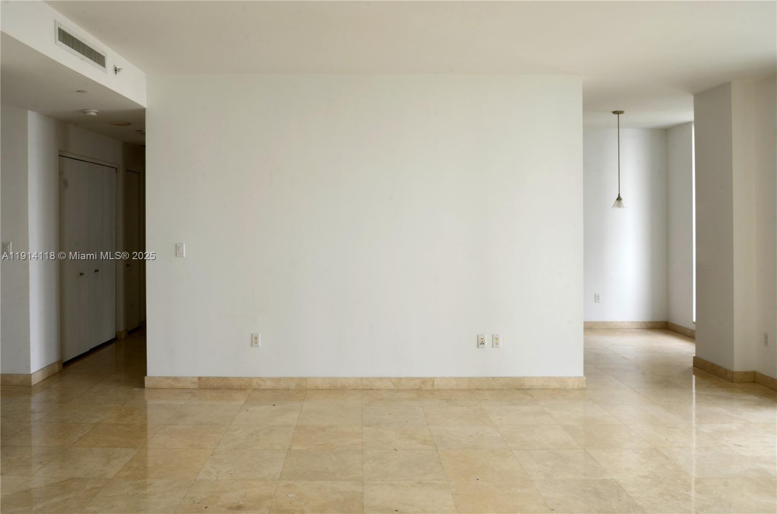 901 Brickell Key Boulevard, Unit 705 Miami, FL 33131 - Photo 4 of 41 a view of an empty room
