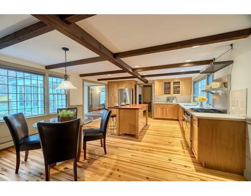 99 Herrick Road Boxford, MA 01921 - Photo 14 of 30 a dining room with furniture and wooden floor