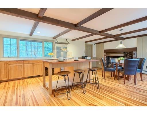 99 Herrick Road Boxford, MA 01921 - Photo 15 of 30 a view of a dining room with furniture and wooden floor