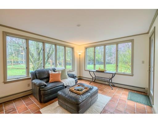 99 Herrick Road Boxford, MA 01921 - Photo 18 of 30 a living room with furniture and a floor to ceiling window