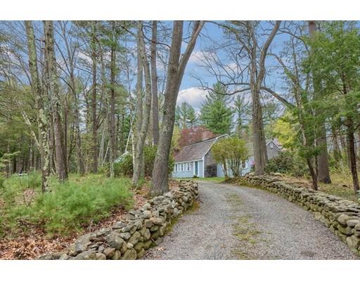 99 Herrick Road Boxford, MA 01921 - Photo 2 of 30 a view of a dirt road with large trees
