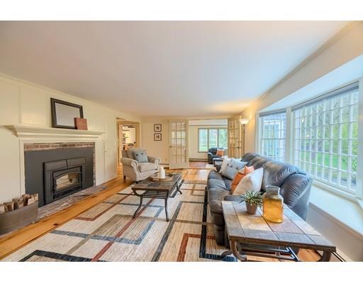 99 Herrick Road Boxford, MA 01921 - Photo 21 of 30 a living room with furniture and a fireplace