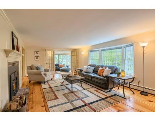 99 Herrick Road Boxford, MA 01921 - Photo 22 of 30 a living room with furniture and a fireplace