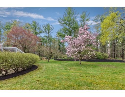 99 Herrick Road Boxford, MA 01921 - Photo 7 of 30 a backyard of a house with lots of green space