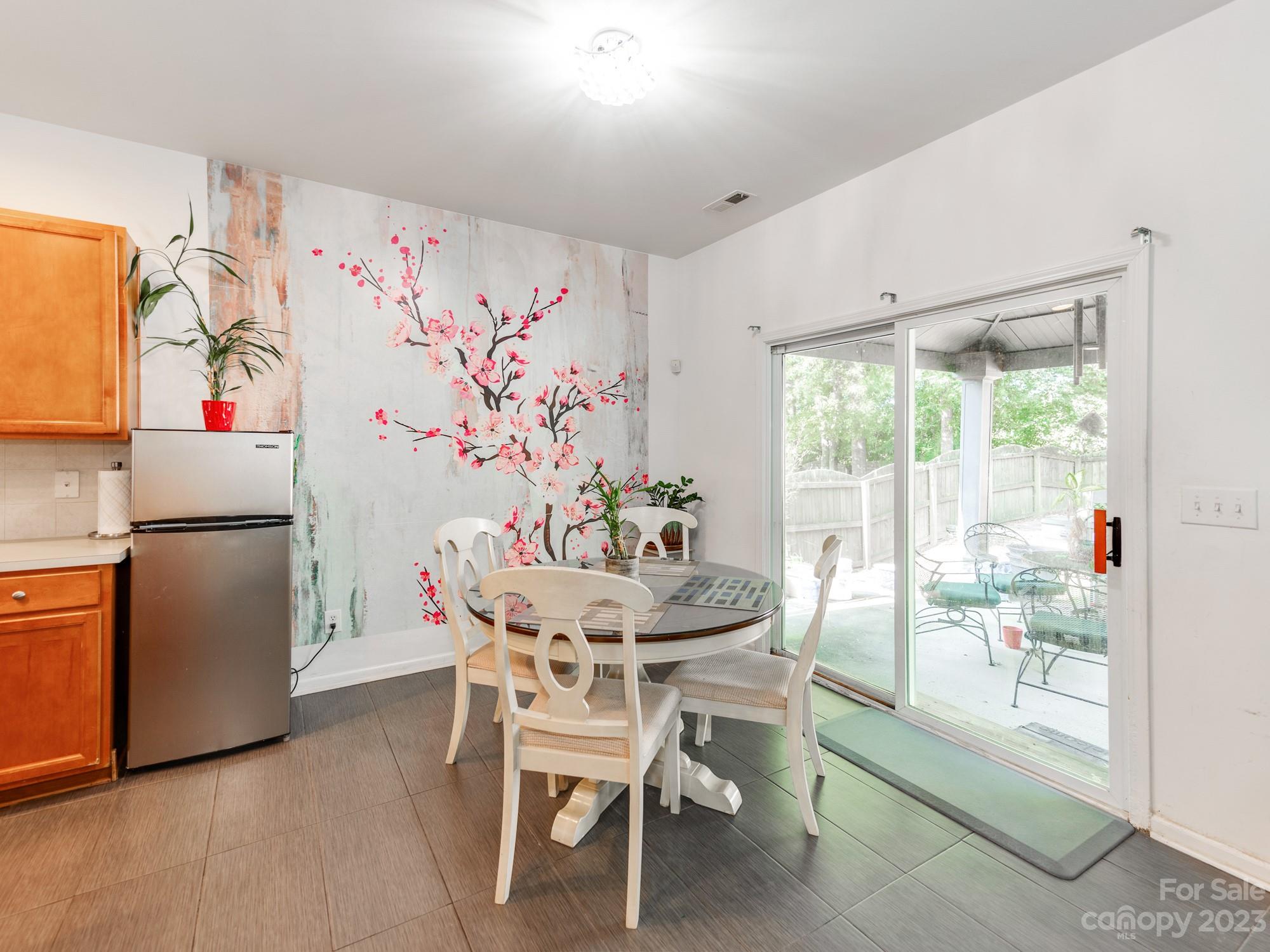 4409 Lawrence Daniel Drive Matthews, NC 28104 - Photo 11 of 38 a dining room with furniture and window