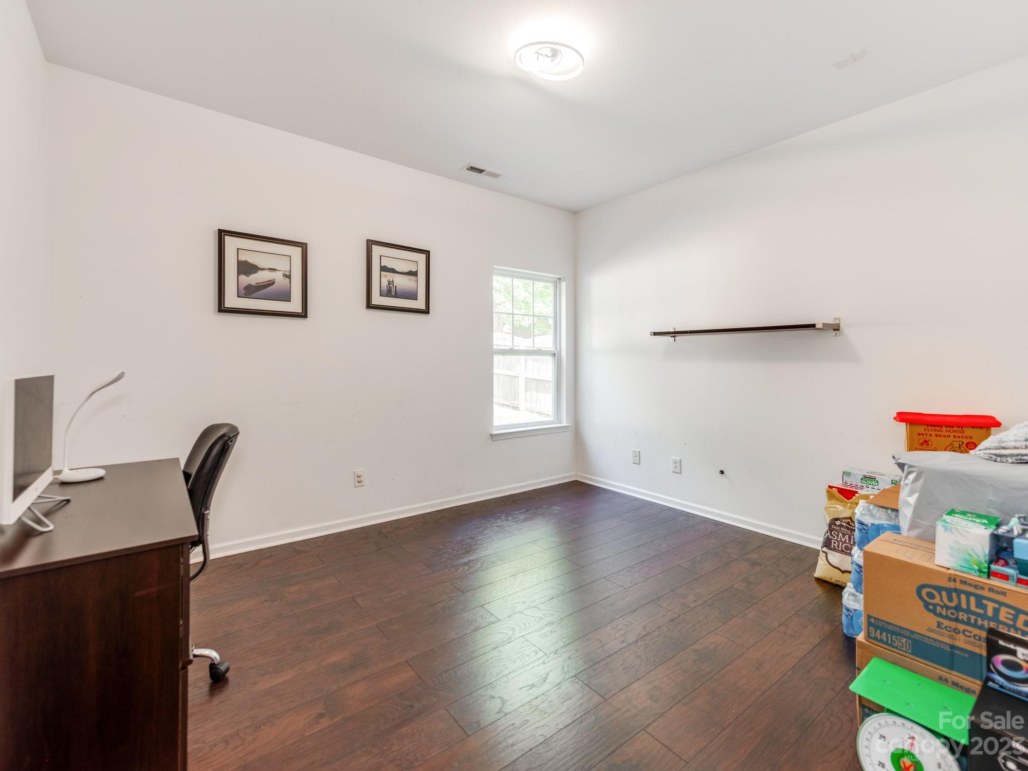 4409 Lawrence Daniel Drive Matthews, NC 28104 - Photo 17 of 38 a view of a workspace with furniture and a window
