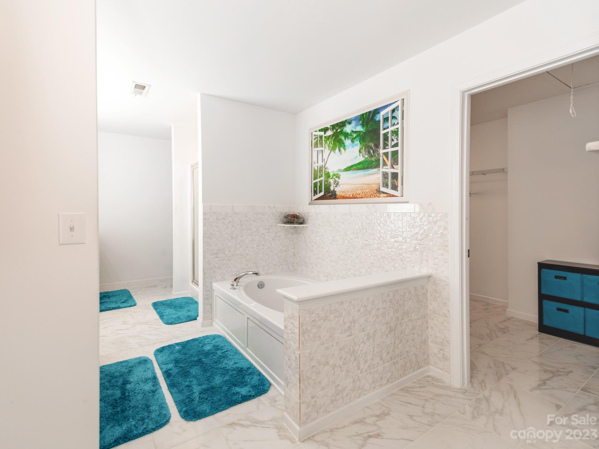 4409 Lawrence Daniel Drive Matthews, NC 28104 - Photo 23 of 38 a bathroom with a sink and a bathtub