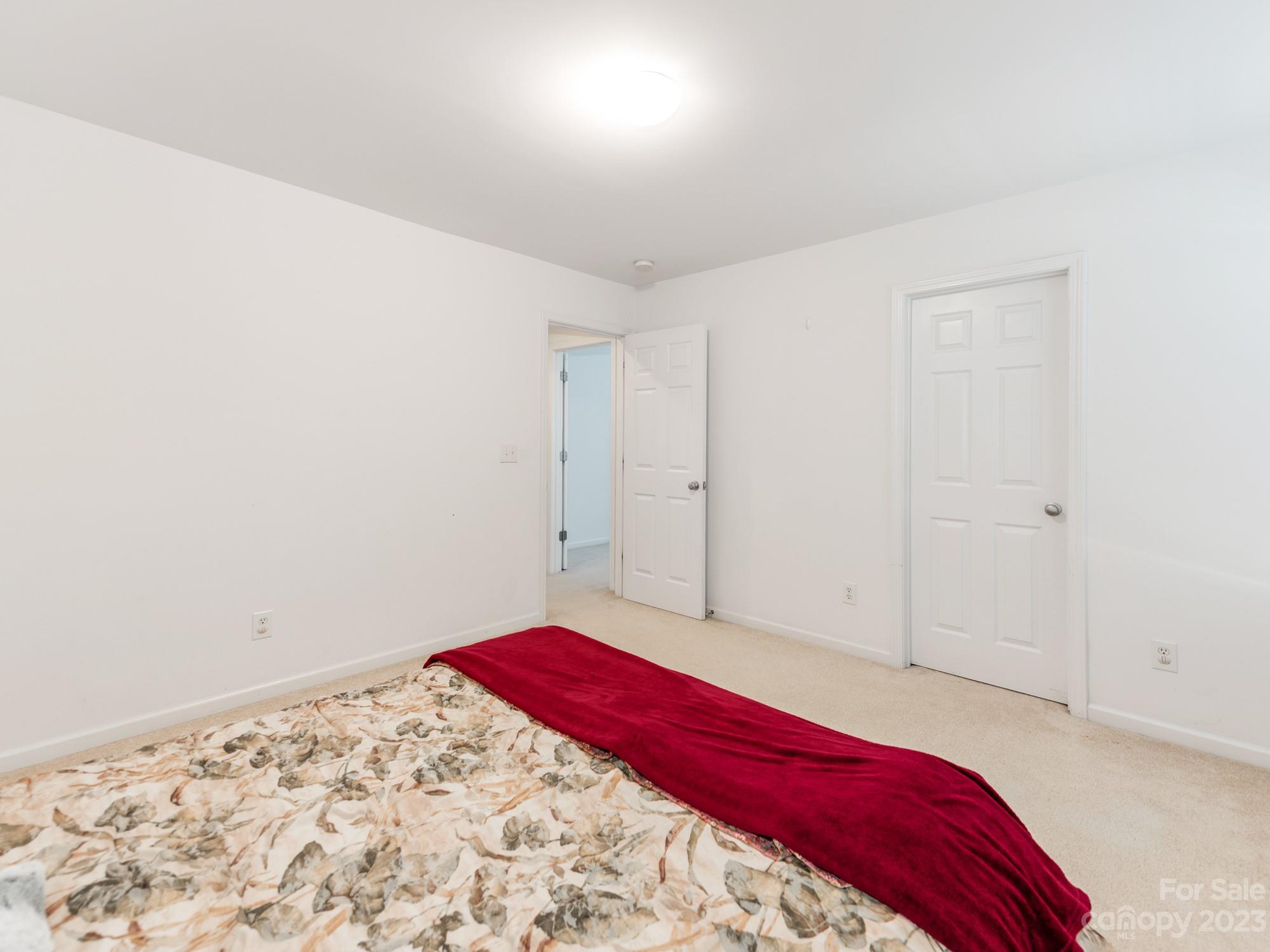 4409 Lawrence Daniel Drive Matthews, NC 28104 - Photo 27 of 38 a bedroom with a bed and a window