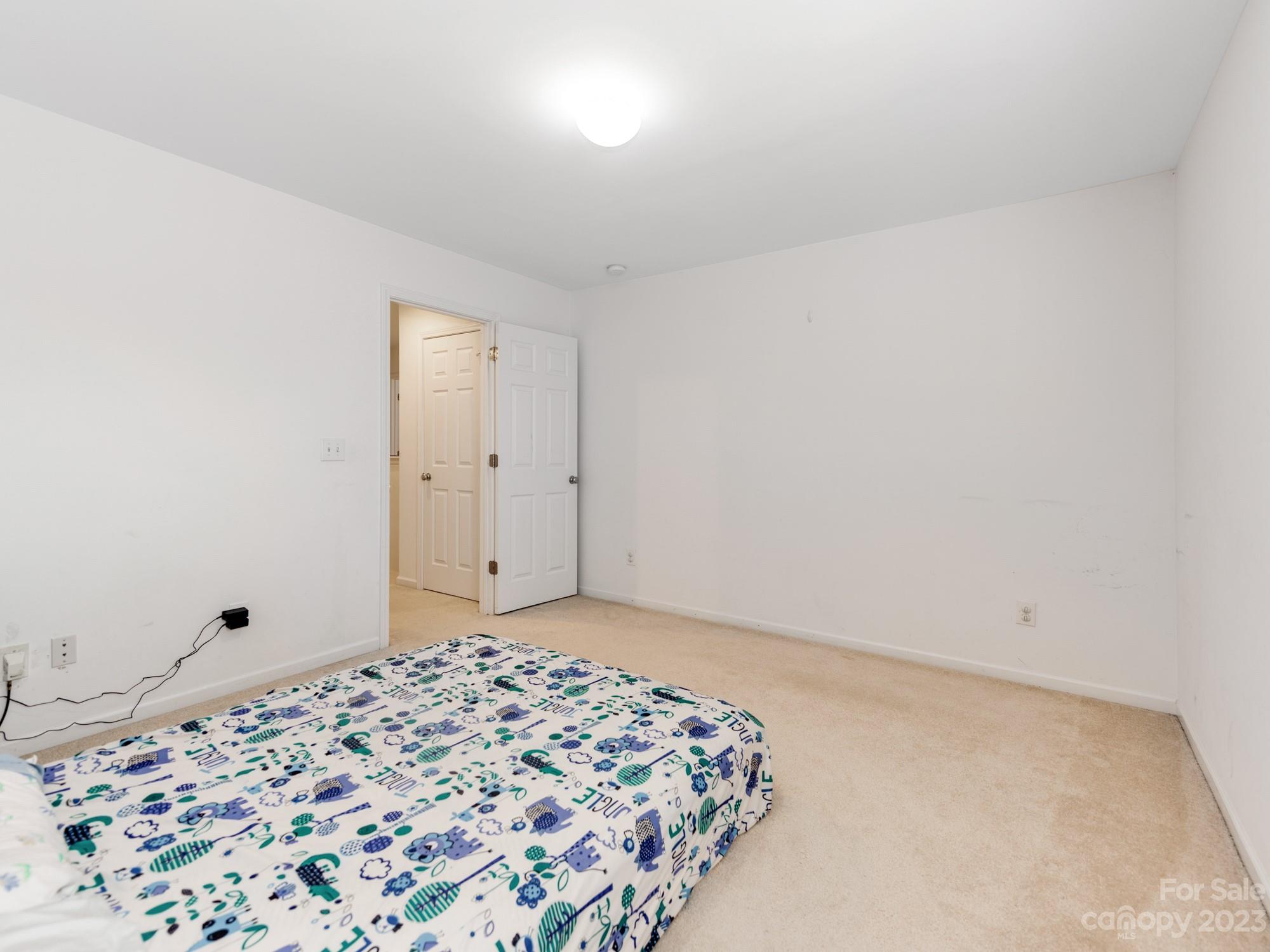 4409 Lawrence Daniel Drive Matthews, NC 28104 - Photo 29 of 38 a big room with a bed