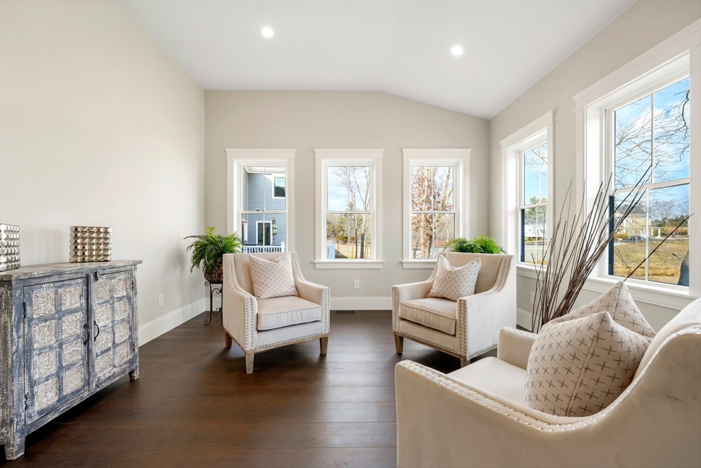 8 Wayside Road Natick, MA 01760 - Photo 15 of 42 a living room with furniture and a large window