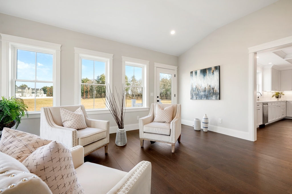 8 Wayside Road Natick, MA 01760 - Photo 16 of 42 a living room with furniture and next to a window