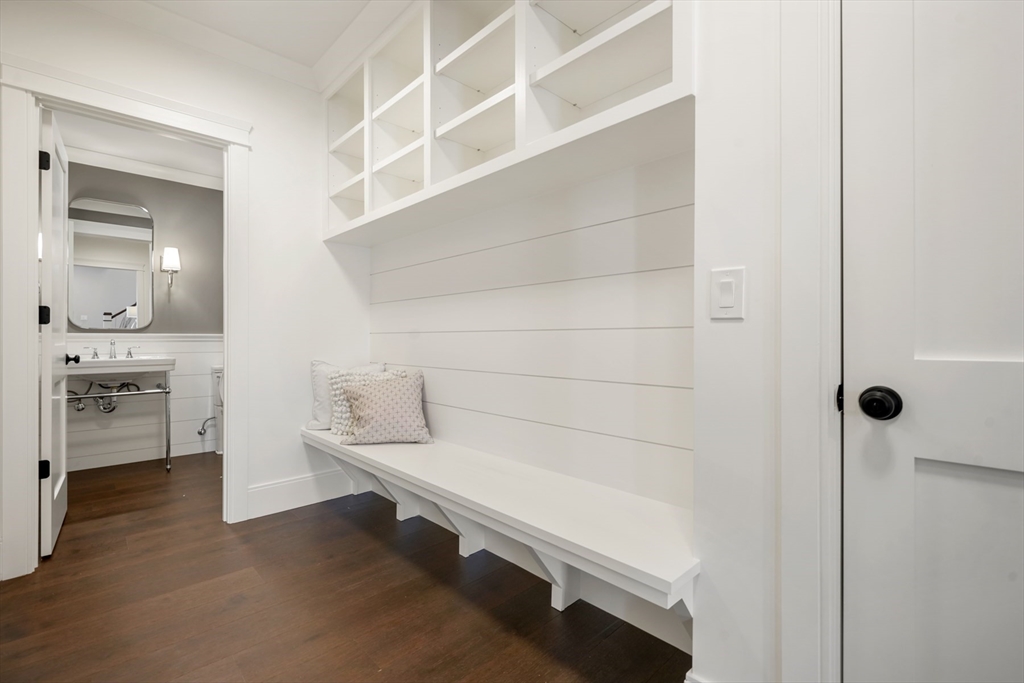 8 Wayside Road Natick, MA 01760 - Photo 17 of 42 a bathroom with a sink and a mirror