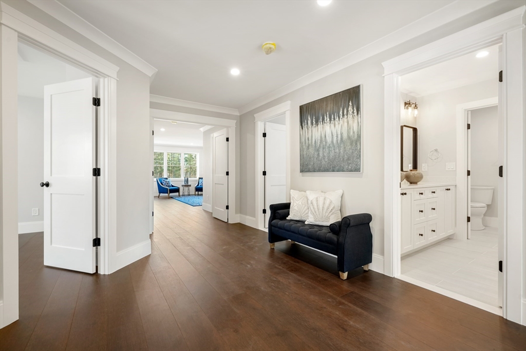 8 Wayside Road Natick, MA 01760 - Photo 23 of 42 a living room with furniture and wooden floor