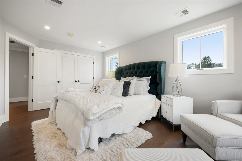 8 Wayside Road Natick, MA 01760 - Photo 26 of 42 a bed room with a bed and a couch