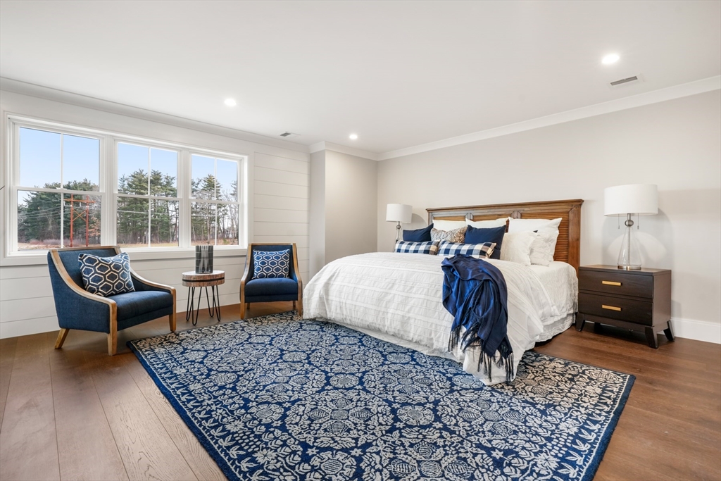 8 Wayside Road Natick, MA 01760 - Photo 28 of 42 a bed room with a bed and a couch