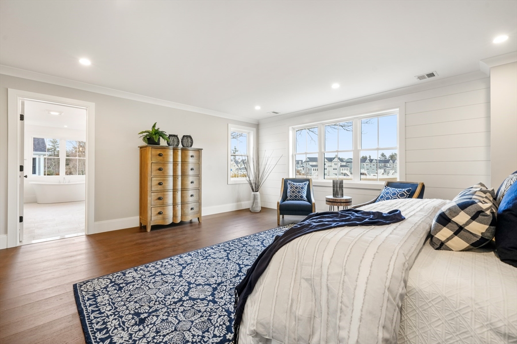 8 Wayside Road Natick, MA 01760 - Photo 30 of 42 a bedroom with a bed and a couch
