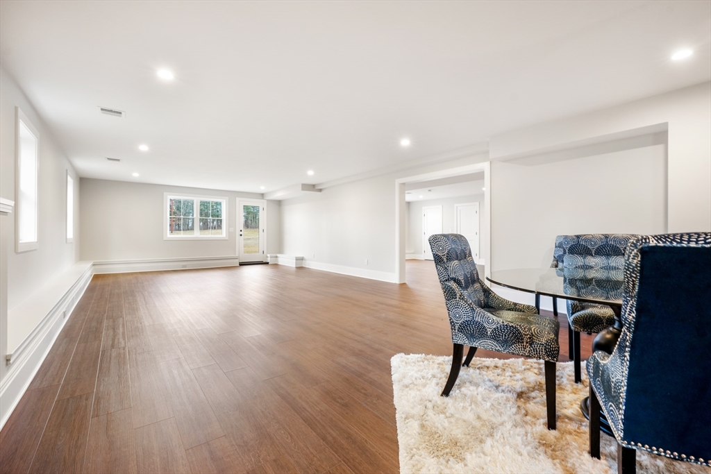 8 Wayside Road Natick, MA 01760 - Photo 37 of 42 a view of a work space with furniture and wooden floor