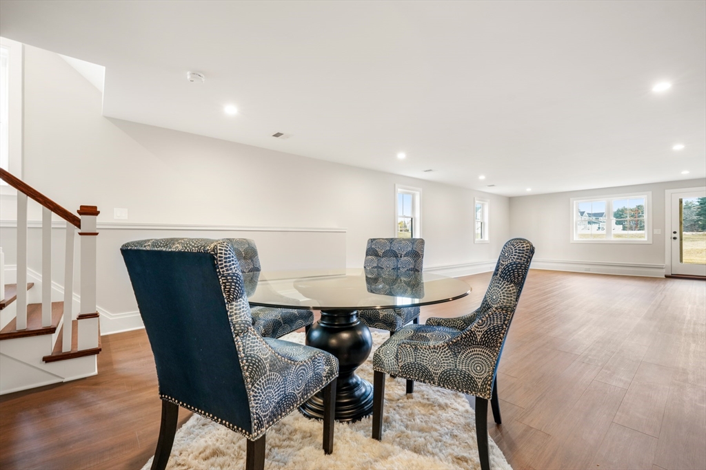8 Wayside Road Natick, MA 01760 - Photo 38 of 42 a view of a dining room with furniture and wooden floor