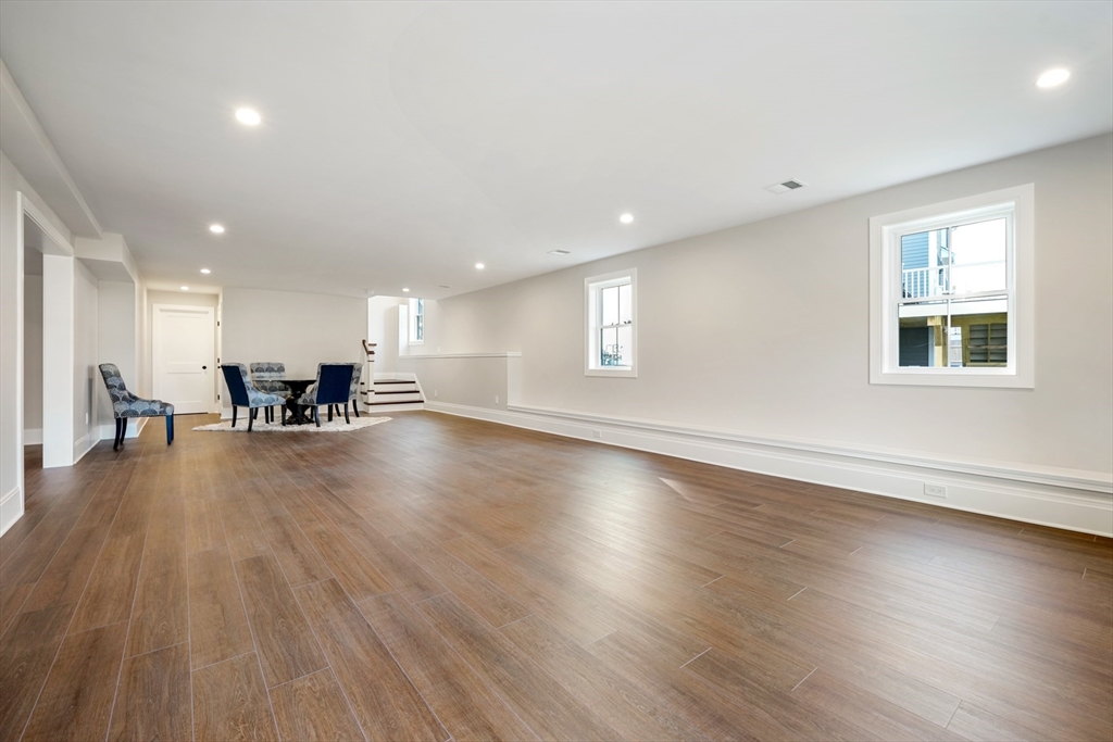 8 Wayside Road Natick, MA 01760 - Photo 42 of 42 a view of a work space with wooden floor and a window
