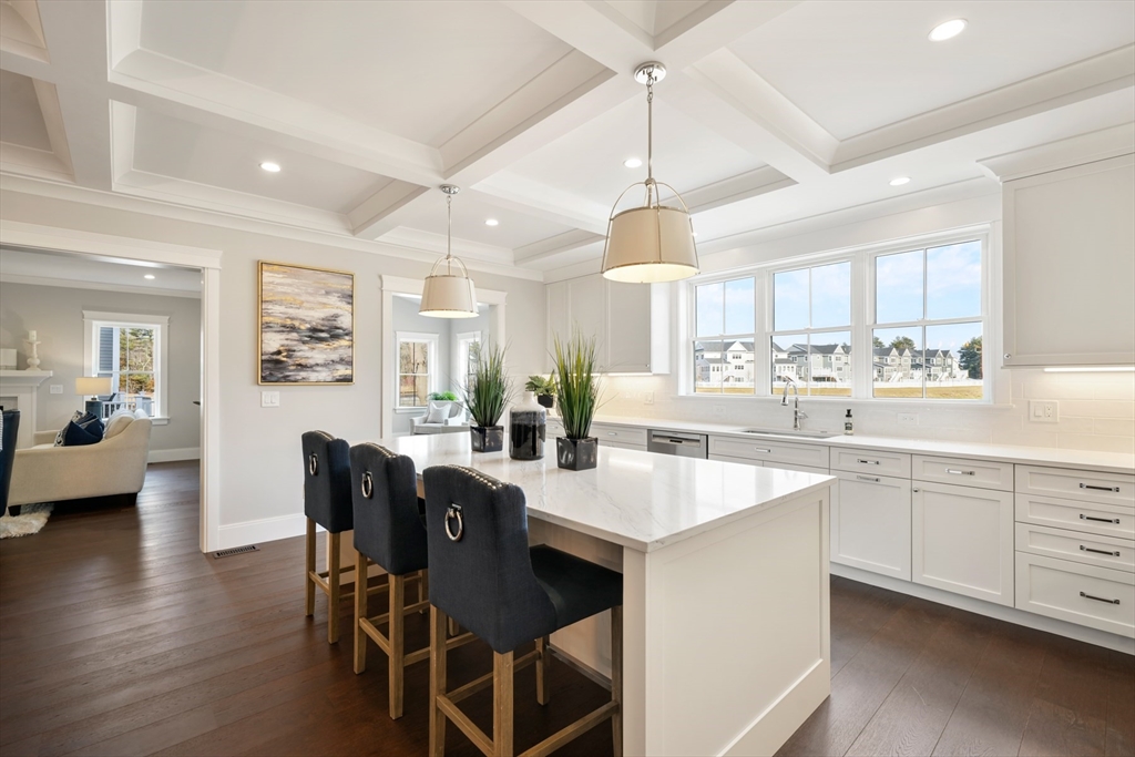 8 Wayside Road Natick, MA 01760 - Photo 5 of 42 a large kitchen with a table and chairs