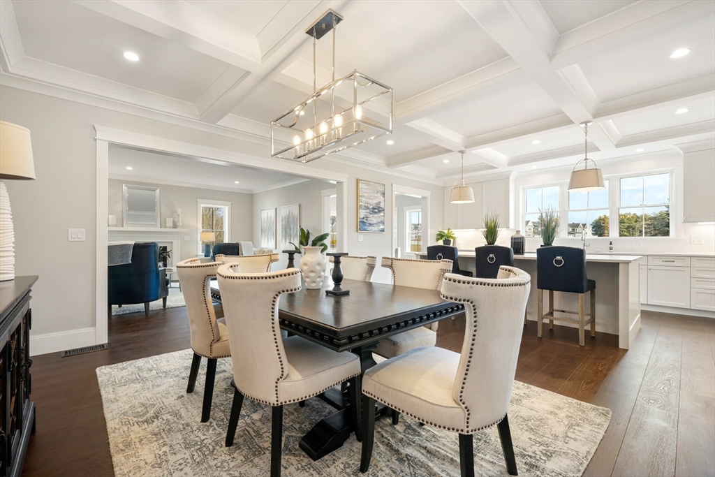 8 Wayside Road Natick, MA 01760 - Photo 7 of 42 a view of a dining room with furniture and wooden floor