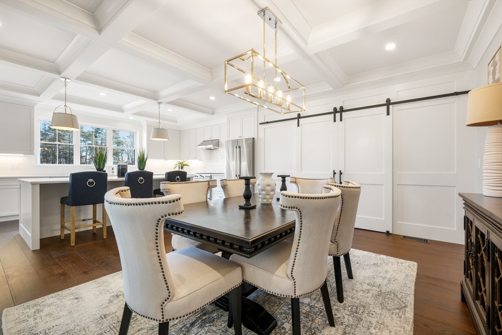 8 Wayside Road Natick, MA 01760 - Photo 8 of 42 a view of a dining room with furniture window and wooden floor