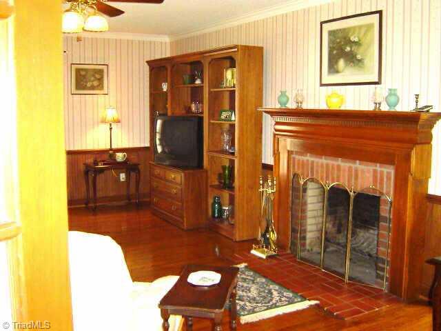 2175 Fuller Mill Road North Thomasville, NC 27360 - Photo 3 of 9 Other. Formal living room with wood burning fireplace, mantle, wood floors