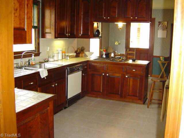 2175 Fuller Mill Road North Thomasville, NC 27360 - Photo 5 of 9 Other. large kitchen, features jenn air Cooktop, lazy susan, ceramic countertops, pantry, broom closet.