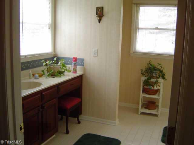 2175 Fuller Mill Road North Thomasville, NC 27360 - Photo 7 of 9 Other. master bath with dual vanity, garden tub, ceramic backsplash around tub