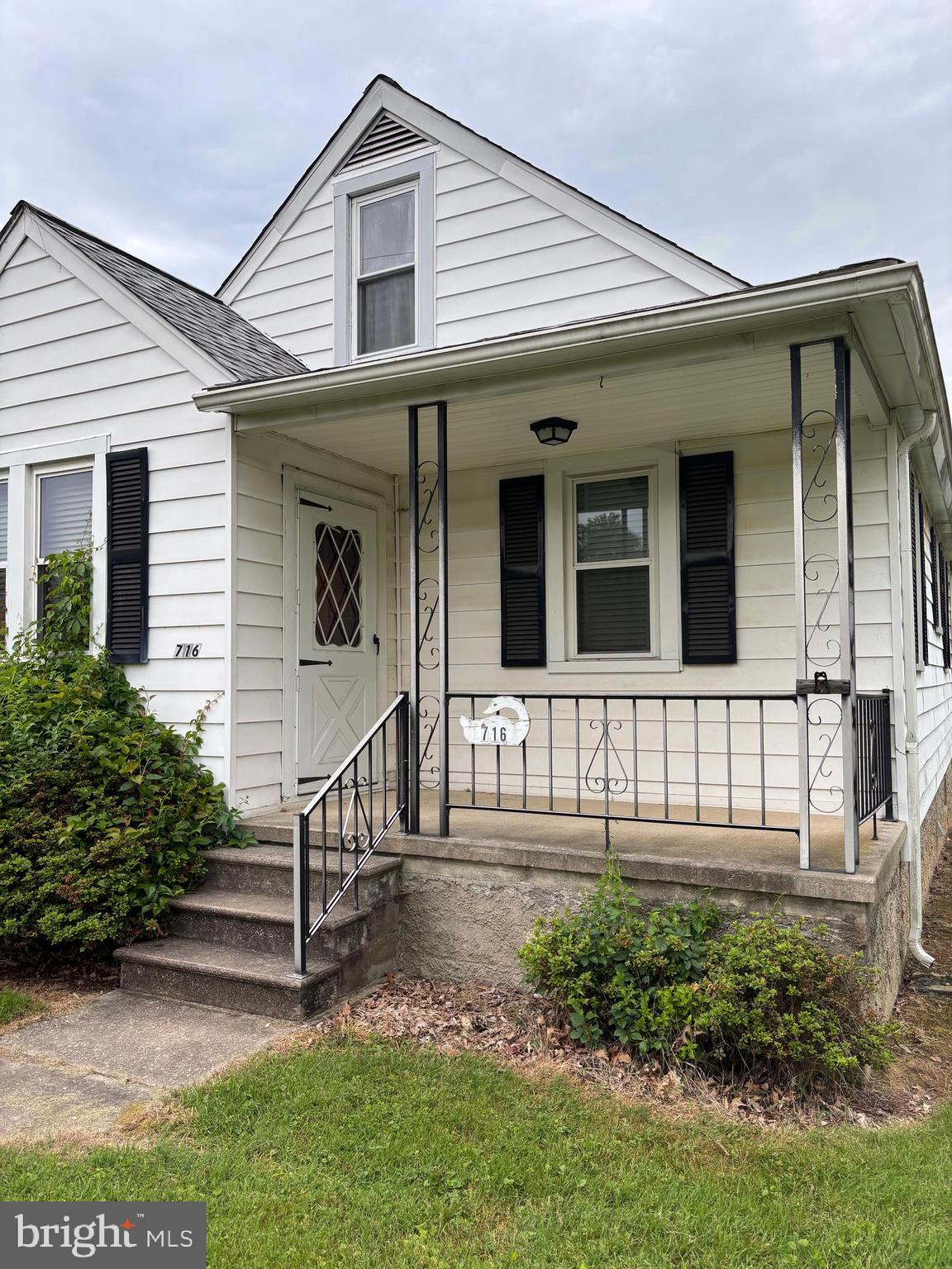 716 Wampler Road Baltimore, MD 21220 - Photo 2 of 21 front view of a house with a yard