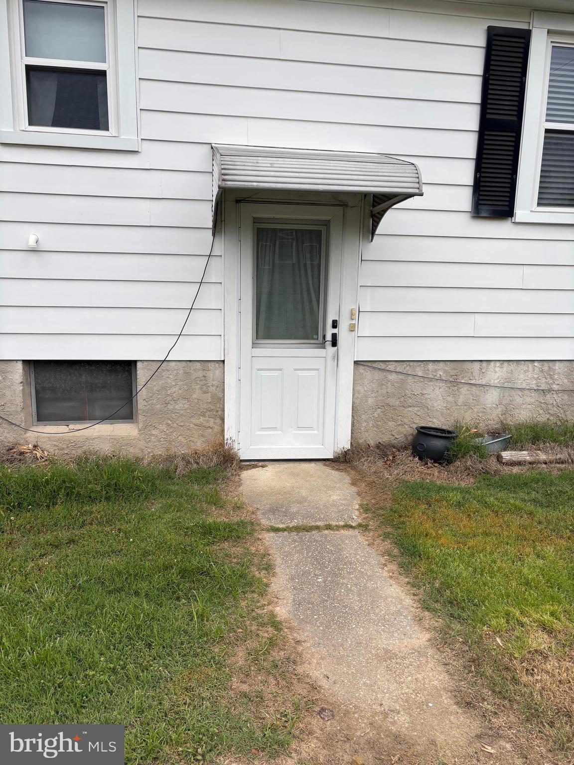 716 Wampler Road Baltimore, MD 21220 - Photo 6 of 21 a view of a house with a yard