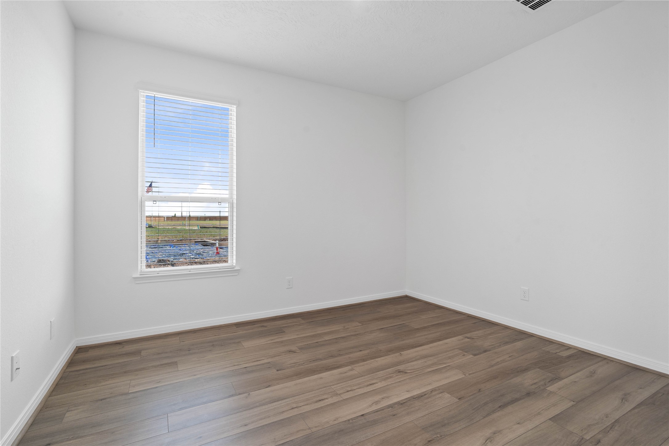 7210 Brooklea Road Beasley, TX 77417 - Photo 6 of 32 Located at the front of the home is this versatile Den which features great natural light and offers the perfect flexible footprint for a dedicated home office, a quiet reading room, or an intimate formal living space.