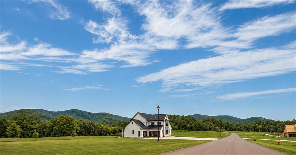 126 Palisade Drive Rydal, GA 30171 - Photo 6 of 36 a view of a town with mountains in the background