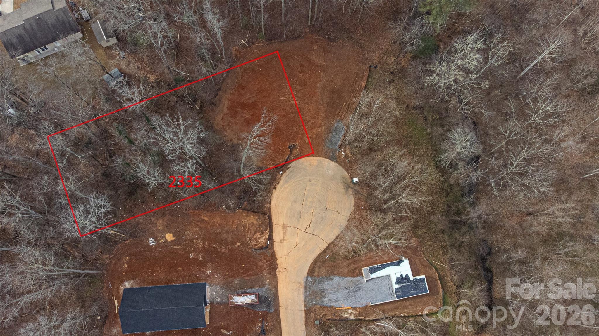 2335 Merts Way Hudson, NC 28638 - Photo 1 of 4 a aerial view of a house with a yard and wooden fence