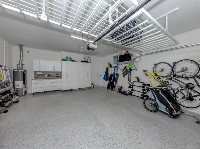 a view of a porch with furniture and a yard