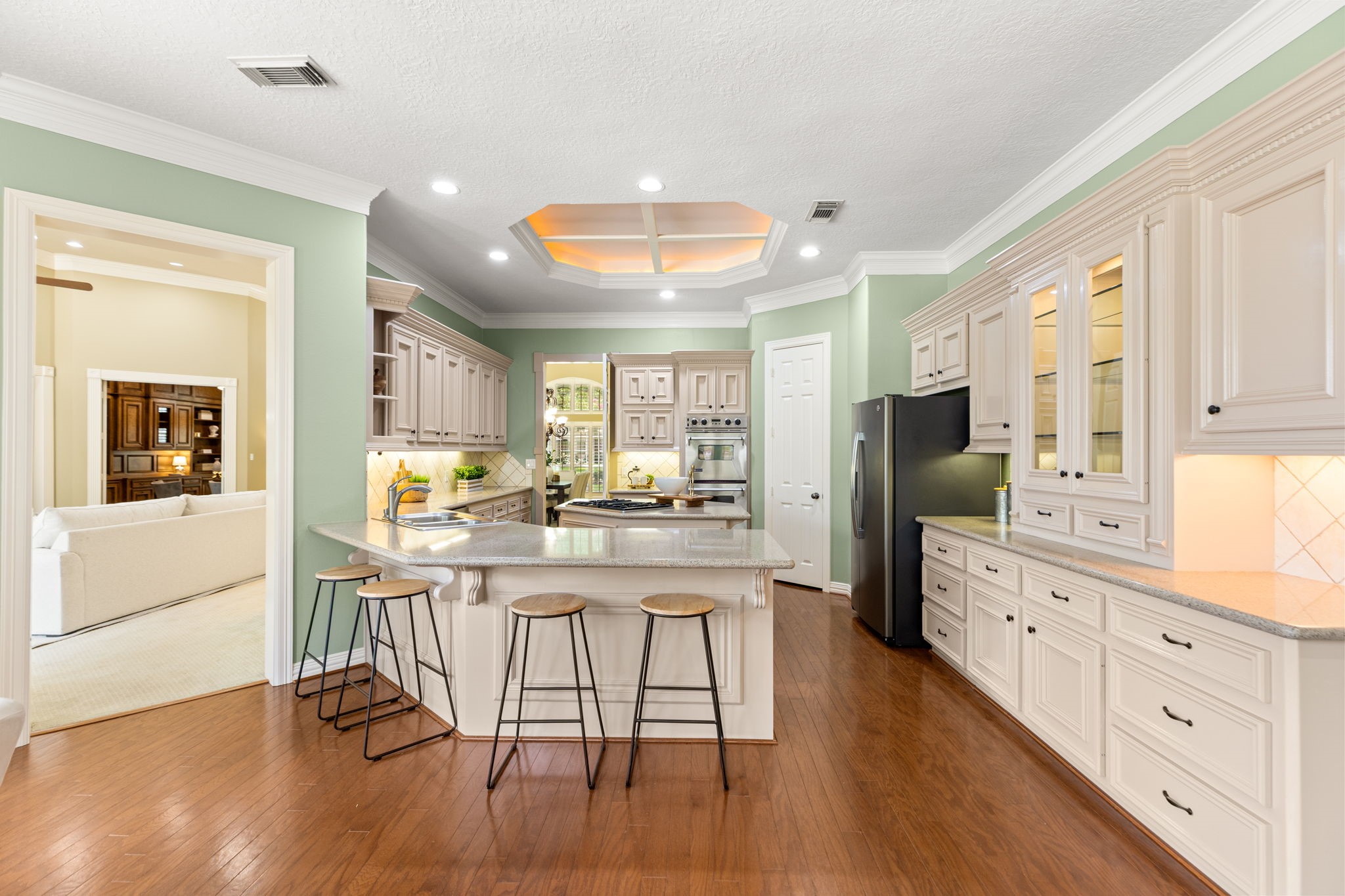 6610 Radley Drive Spring, TX 77379 - Photo 11 of 50 Updated kitchen opens to breakfast and Family room with direct access to formal dining and living rooms. Octagon lights accentuates high ceilings.