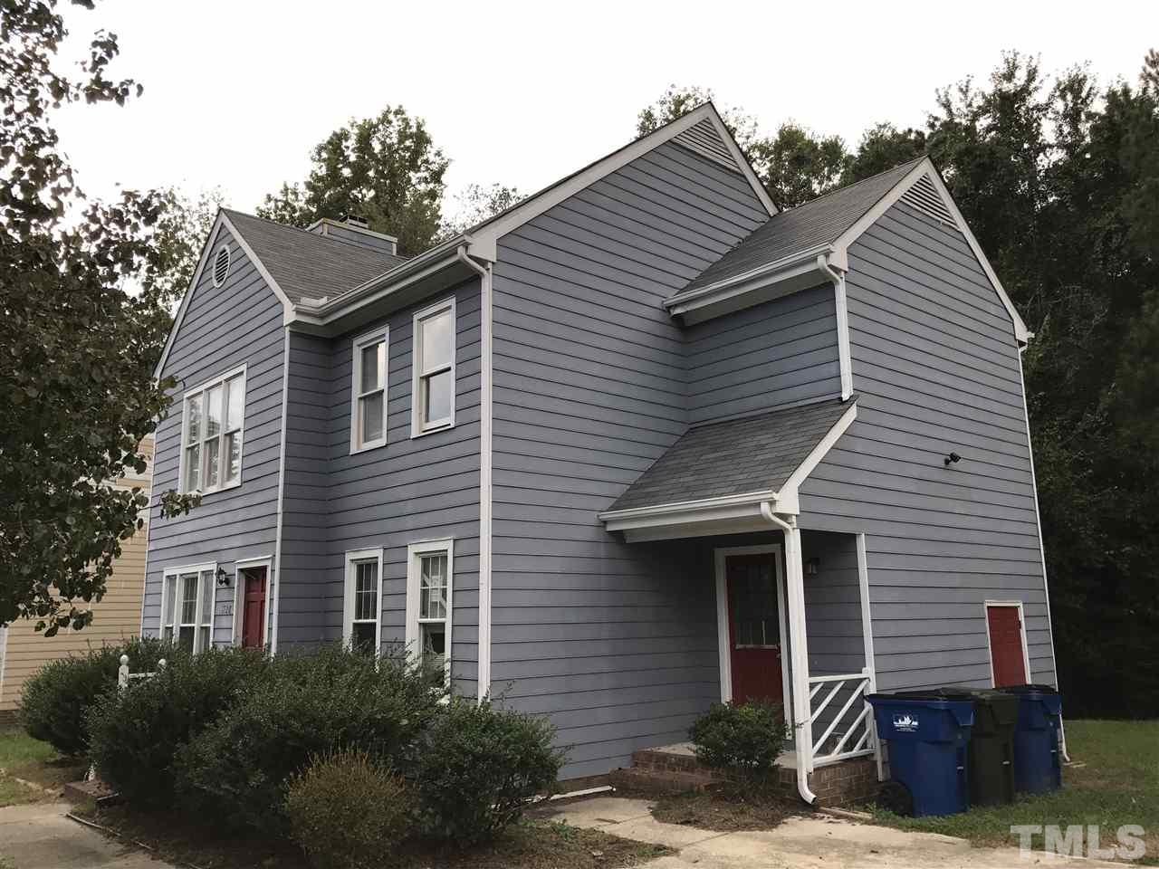 1728 Vintage Road Raleigh, NC 27610 - Photo 3 of 16 a view of house with a yard and potted plants