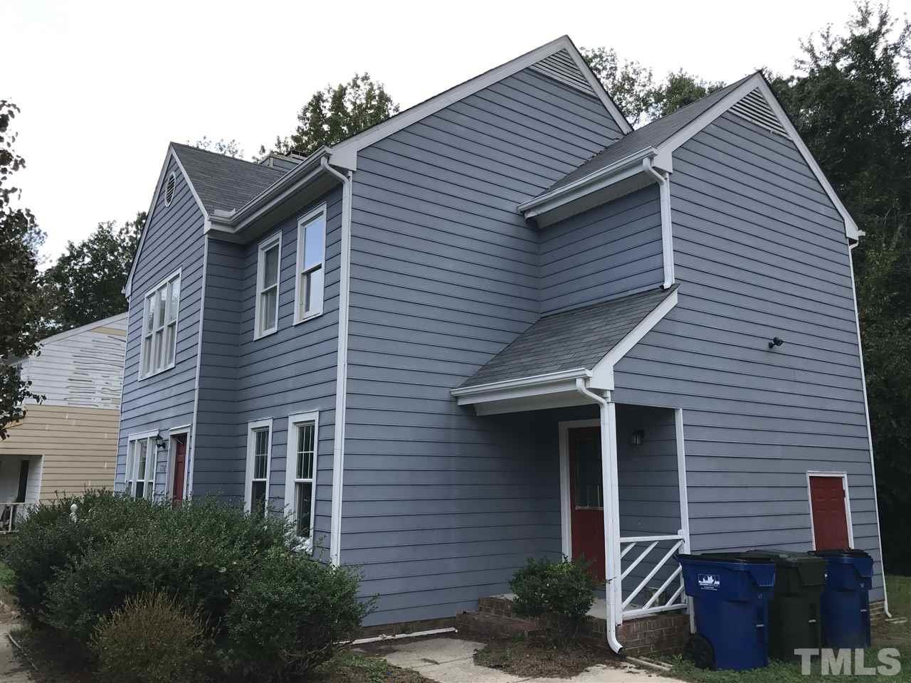 1728 Vintage Road Raleigh, NC 27610 - Photo 4 of 16 a front view of a house with garden