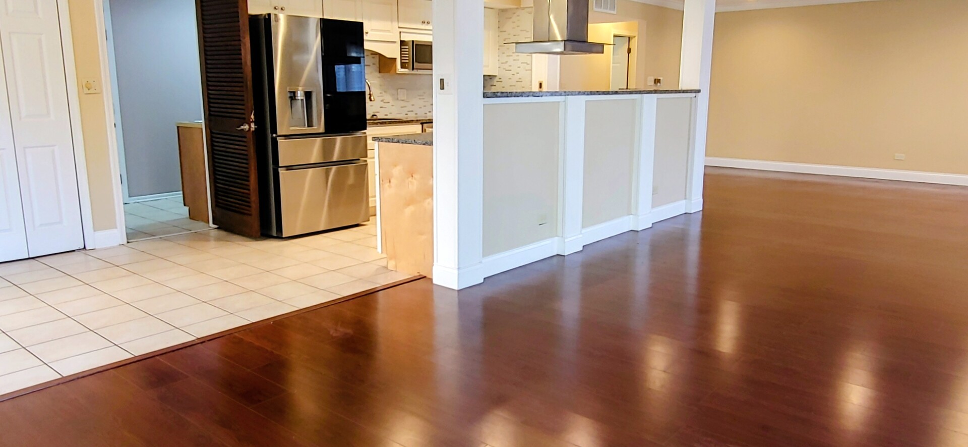 1160 Hassell Road Hoffman Estates, IL 60169 - Photo 6 of 24 a view of a kitchen with wooden floor