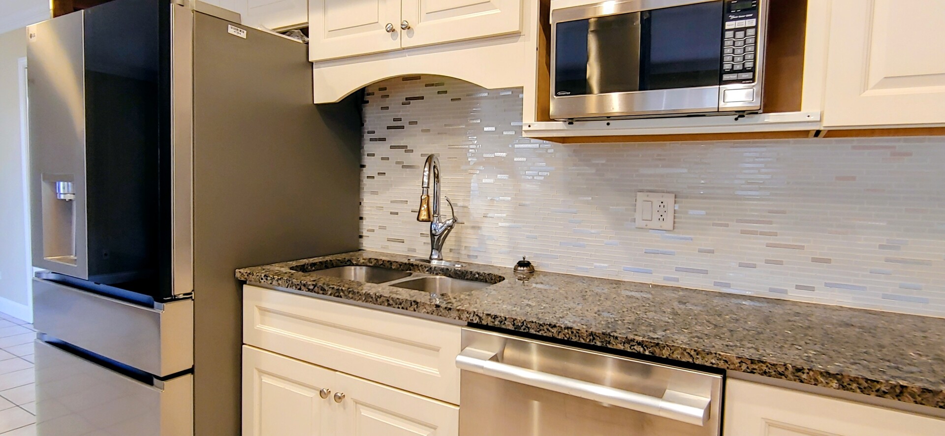 1160 Hassell Road Hoffman Estates, IL 60169 - Photo 10 of 24 a bathroom with a granite countertop sink and a mirror