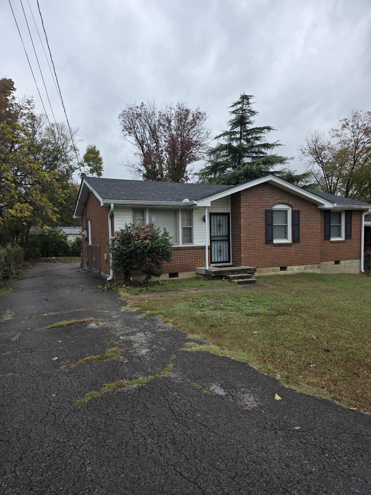 226 Becklea Drive Madison, TN 37115 - Photo 2 of 20 a front view of house with yard and green space