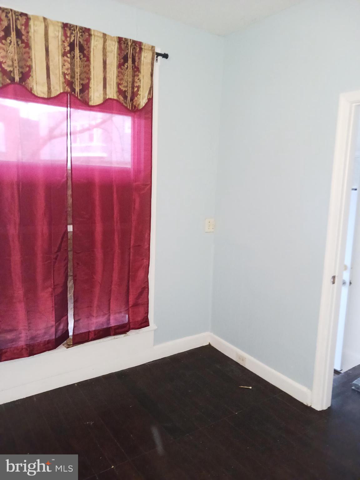 1708 Normal Avenue Baltimore, MD 21213 - Photo 2 of 14 a view of a room with wooden floor