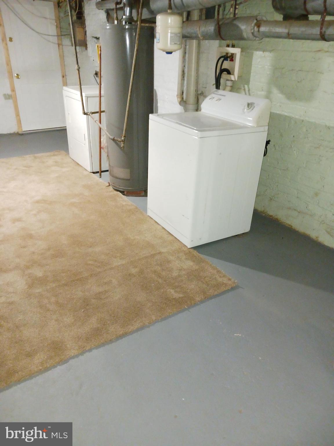 1708 Normal Avenue Baltimore, MD 21213 - Photo 4 of 14 a view of a storage & utility room with a sink