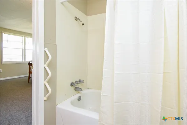 a bathroom with a bathtub