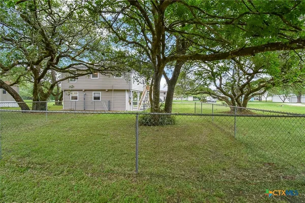 a view of a house with a big yard