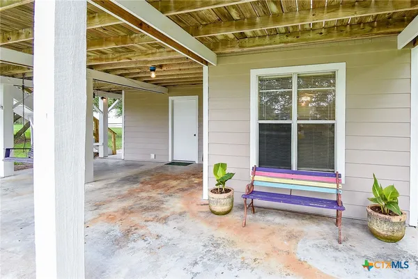 a view of front door of house with outdoor space