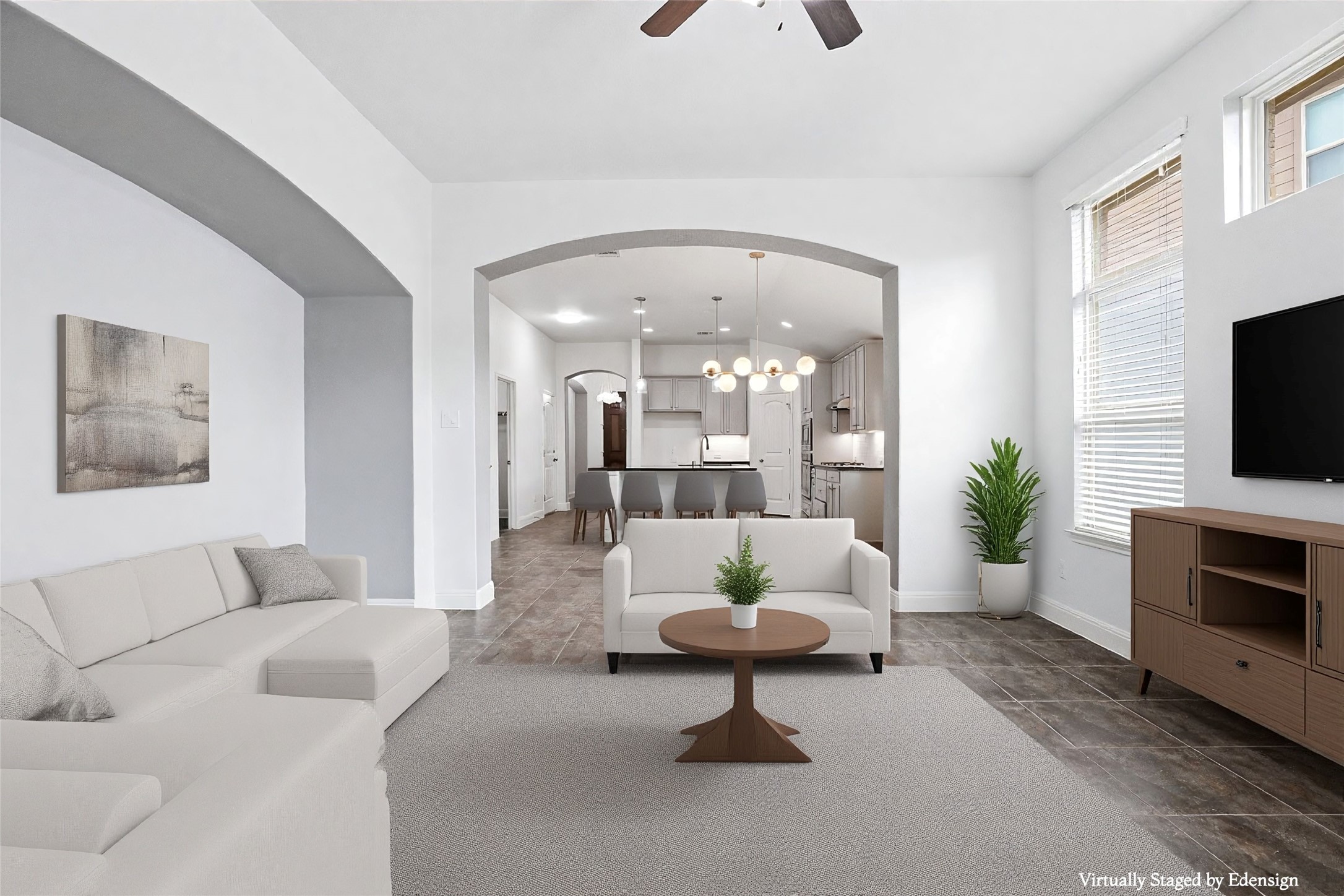 152 Stone View Trail Austin, TX 78737 - Photo 16 of 33 Spacious living area featuring an arched entryway, recessed lighting, and a ceiling fan