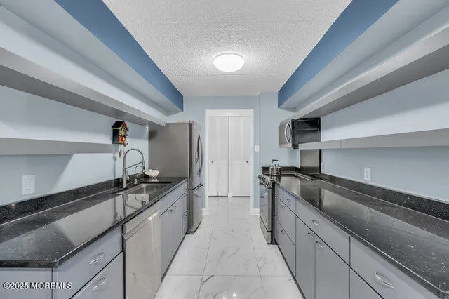 a living room with furniture a rug and a table