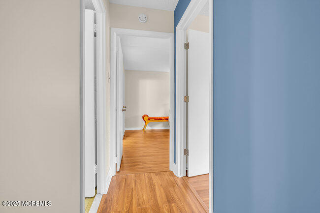 860 Lower Ferry Road, Unit 1K Ewing, NJ 08628 - Photo 27 of 49 a view of a bedroom from a hallway