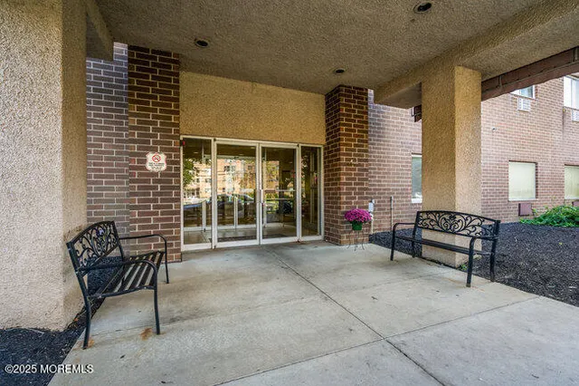 a view of a lounge chairs in the porch
